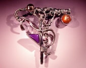 Brooch of Sugilite and Moonstone in Sterling Silver with 18 karat Gold   Ode To A Border Fence