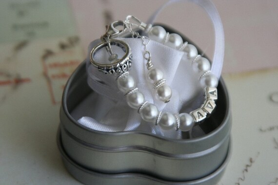 child's chunky style. Elegant Pearl Princess Heirloom Bracelet with personalization and charm