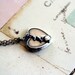 rabbit. locket necklace. silver ox