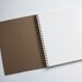 triangle notebook no. 2 ... white, pink, orange, and black on kraft