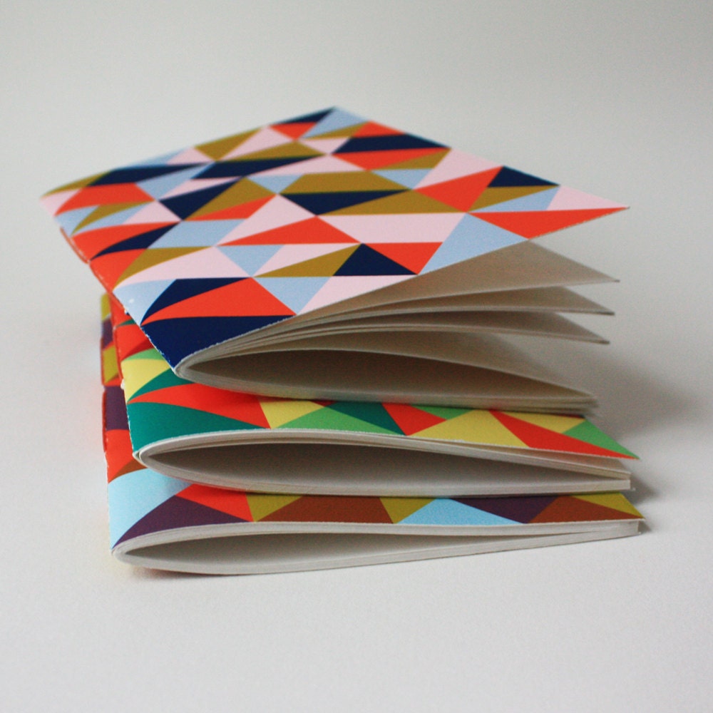 triangle jotter ... with navy, orange, and pink