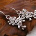 Sterling silver raindrop twisted bud earrings