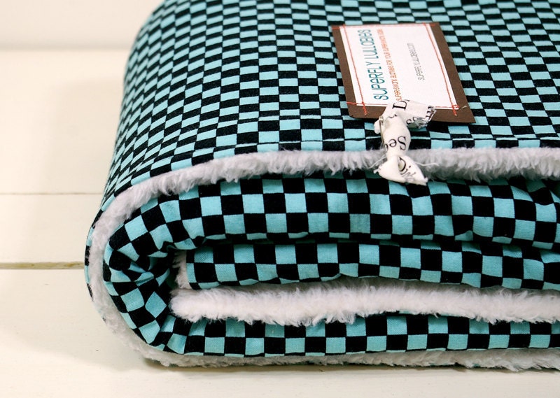 baby blanket, checkered aqua and black, totally rad and parent-friendly.