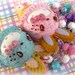 Hello kitty kawaii sweet ice cream cone bunny pen necklaces with star bow waffle cookie ears and pink purple pastel beaded chain