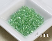 ON SALE 100 pcs. Swarovski Crystal Bicone Chrysolite  4 mm.