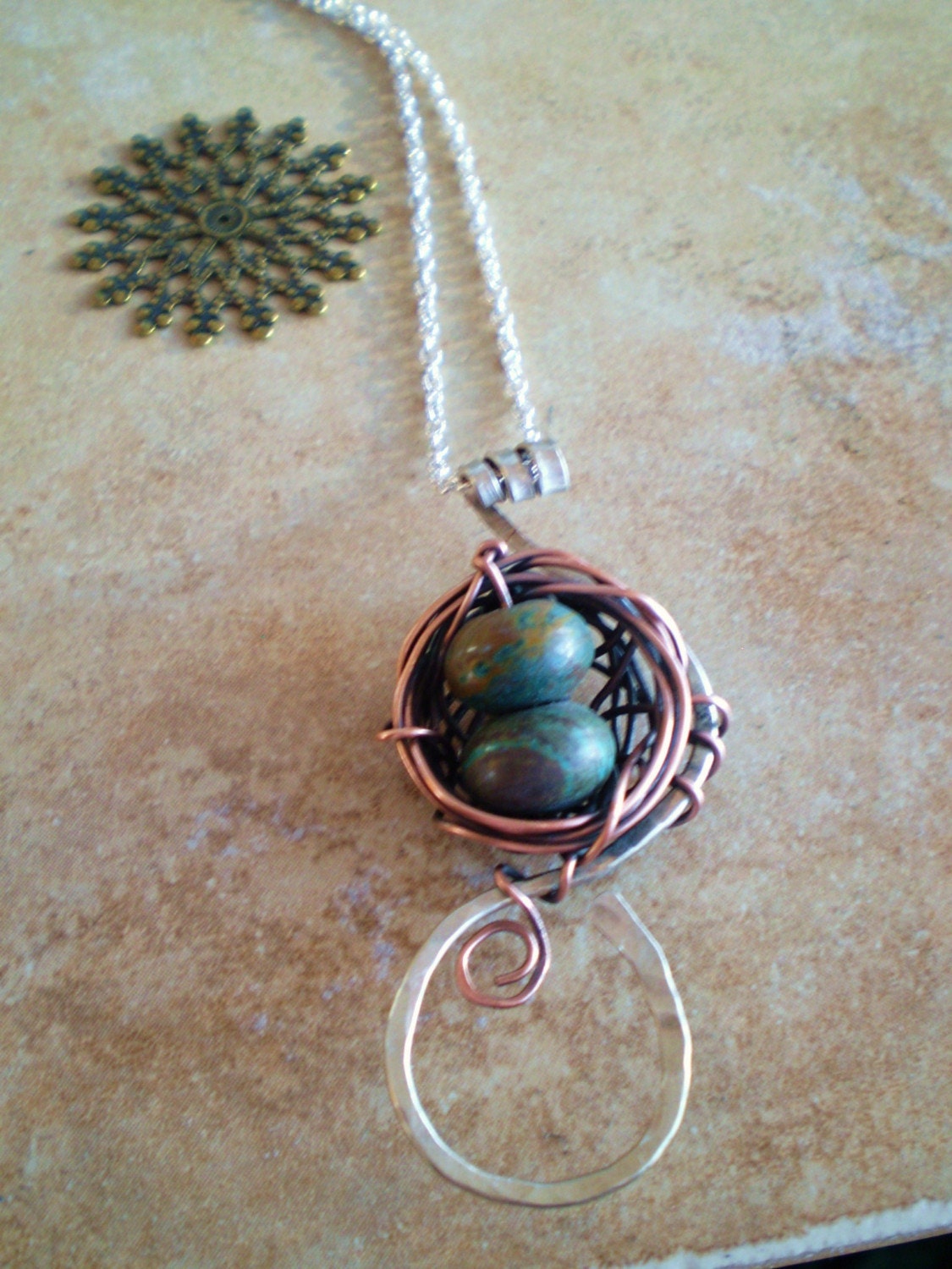 Birds nest mixed metals pendant