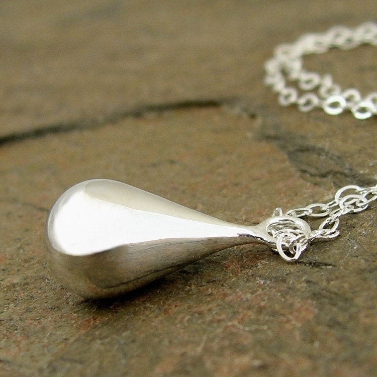 Sleek sterling silver necklace. Contemporary tear drop pendant, minimalist modern jewelry