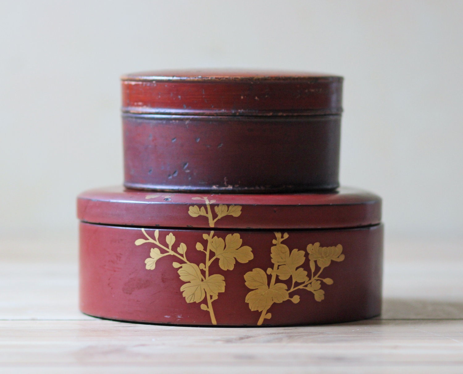 pair red lacquered lidded boxes