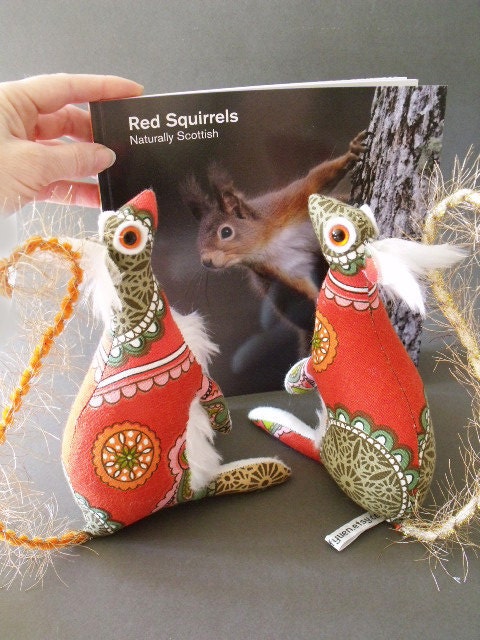 Baby Squirrel Sparkle loves all the sparkly sparkles around her         life size real red squirrel  Soft Sculpture