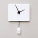 Clock made from a recycled Apple ibook G4 computer case