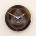 clock made from a recycled magnetic tape reel