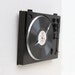 Clock made from a recycled Fischer turntable