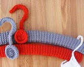 the handknitted hanger set in grey and red