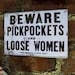 retro vintage beware pickpockets and loose women sign