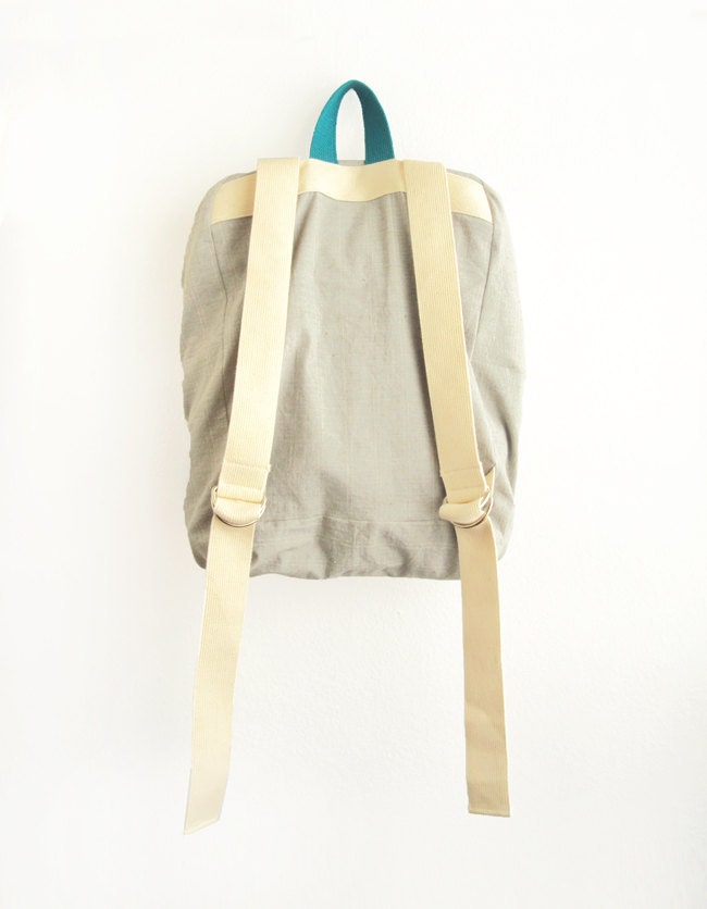 Light grey with thin stripes backpack with neon yellow pouch