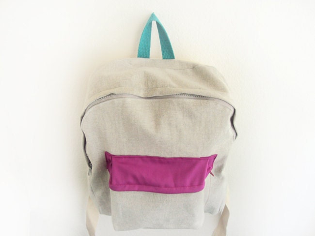 light grey denim backpack with magenta pouch