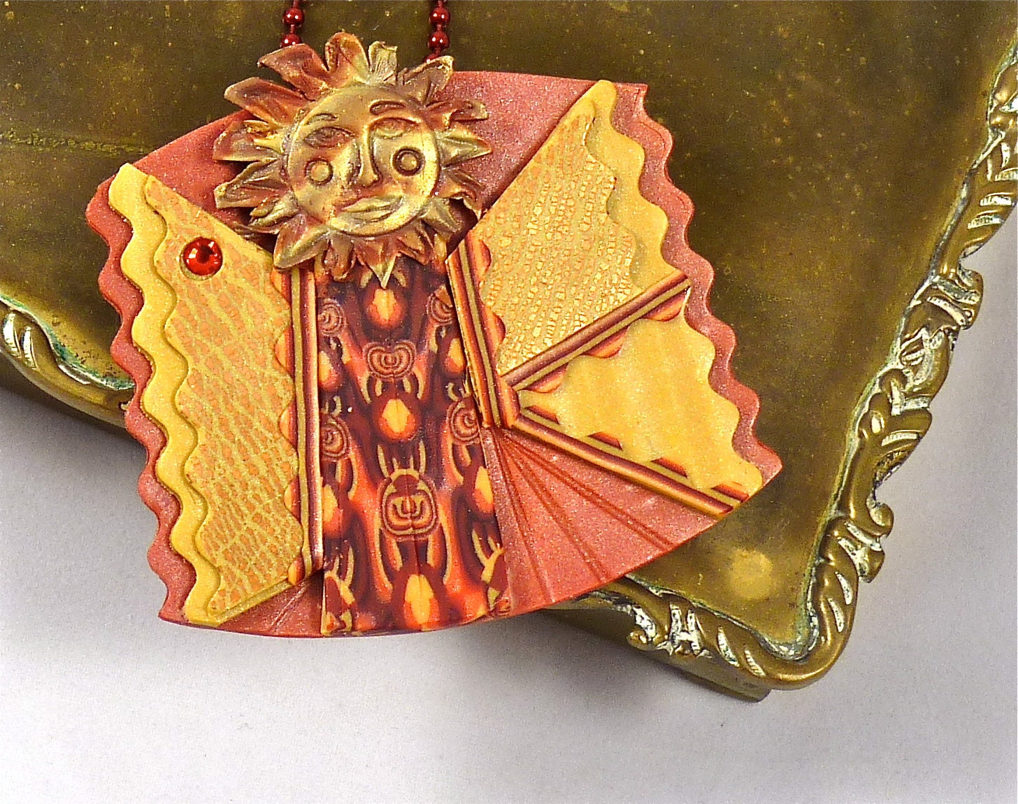 Aztec Inspired Sun Pendant and or Brooch made from Polymer Clay