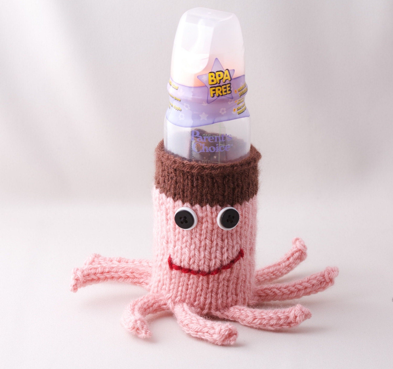 Baby Bottle Cuptopus Cozy in Pink and Brown with white and Black Buttons