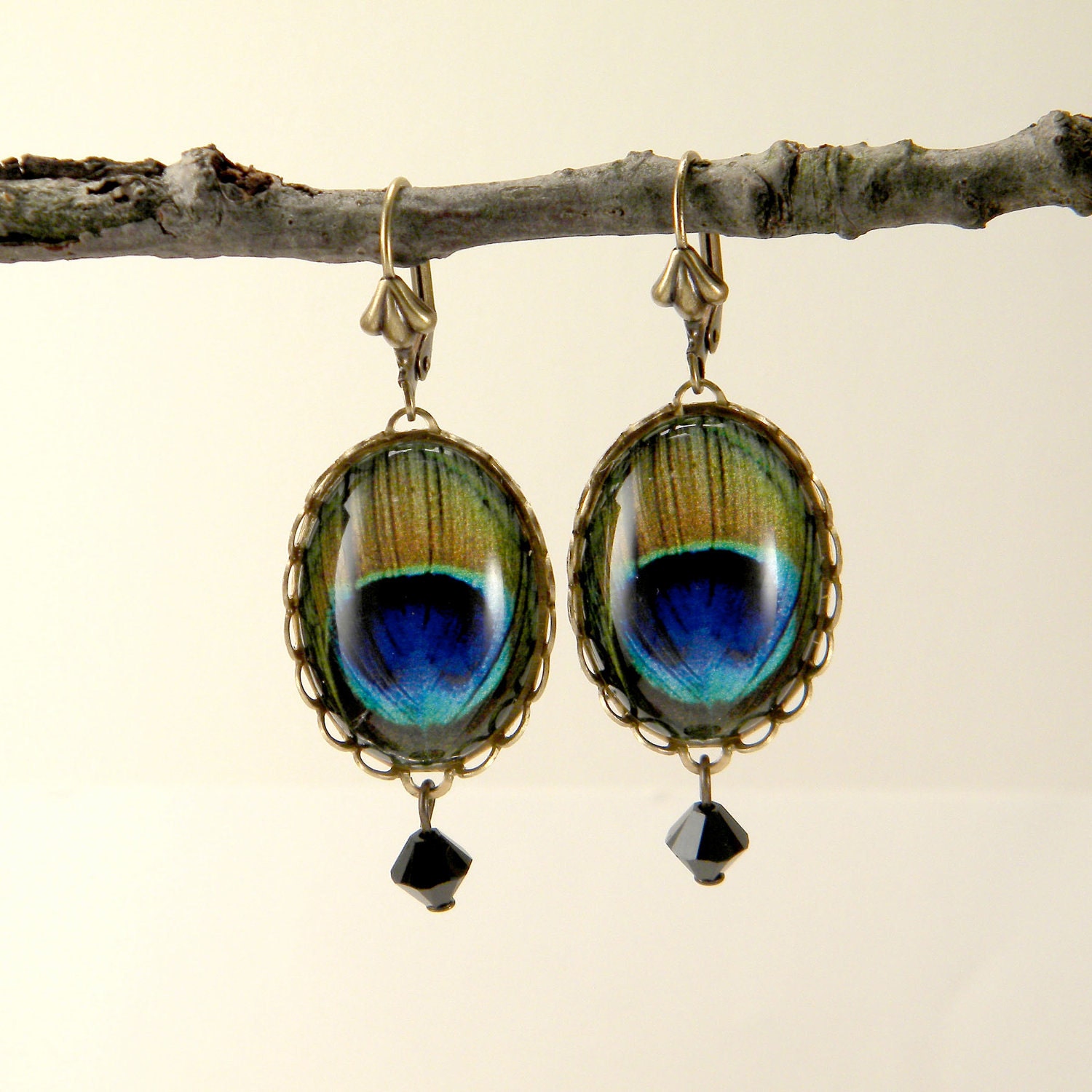 Miss Peacock-vintage brass Victorian style peacock feather cameo dangle earrings with black faceted crystal