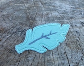 light turquoise linen feather brooch