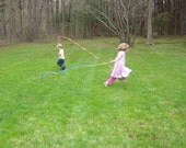 Hand-dyed purple polka-dot silk ribbon stick wand for children's play, with woodburned personalization