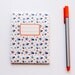Notepad, orange and navy blue pattern with octopus and sea stars