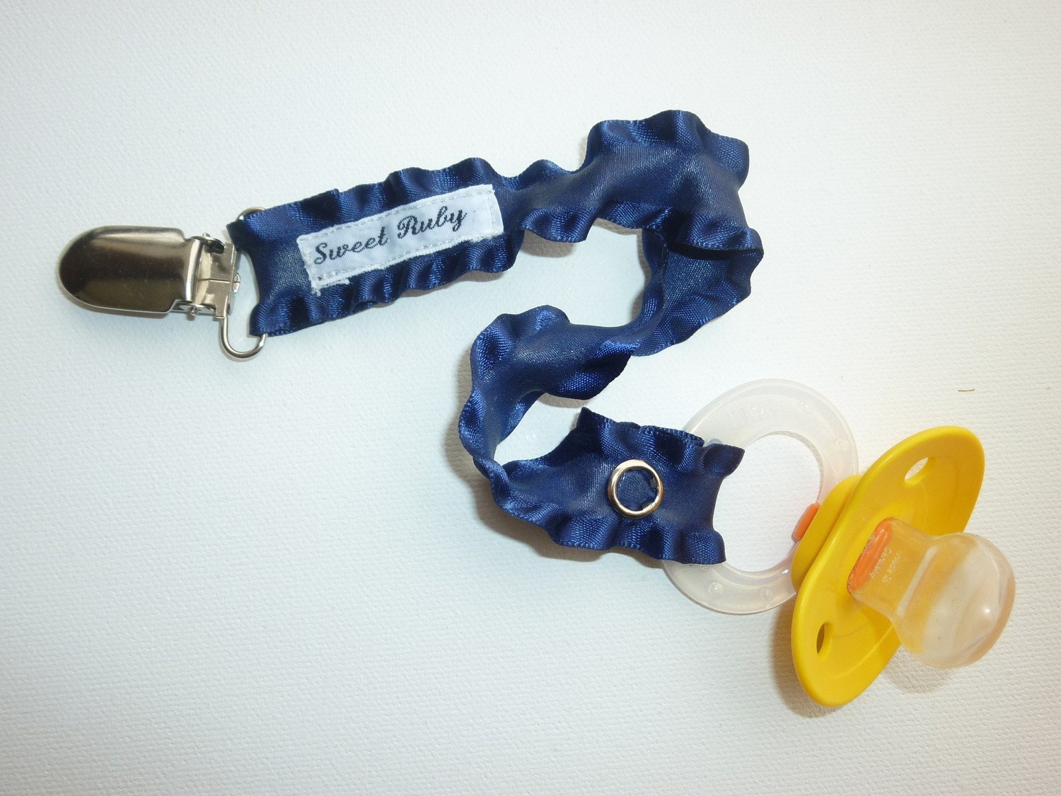 Navy Ruffle Pacifier Clip