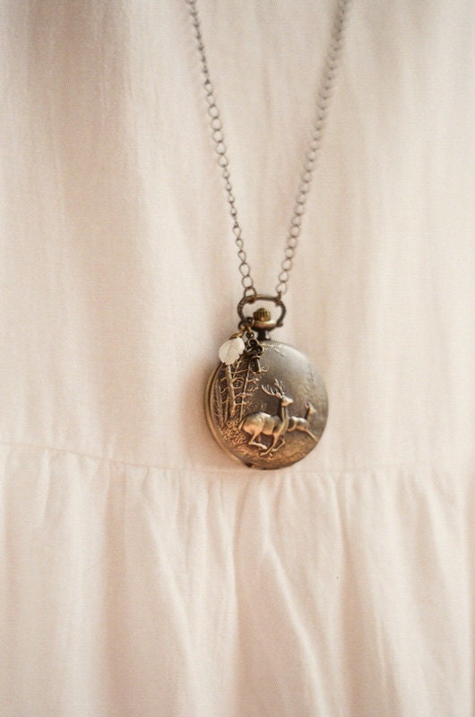 Antique bronze pocket watch necklace featuring a running deer - Discover secret places