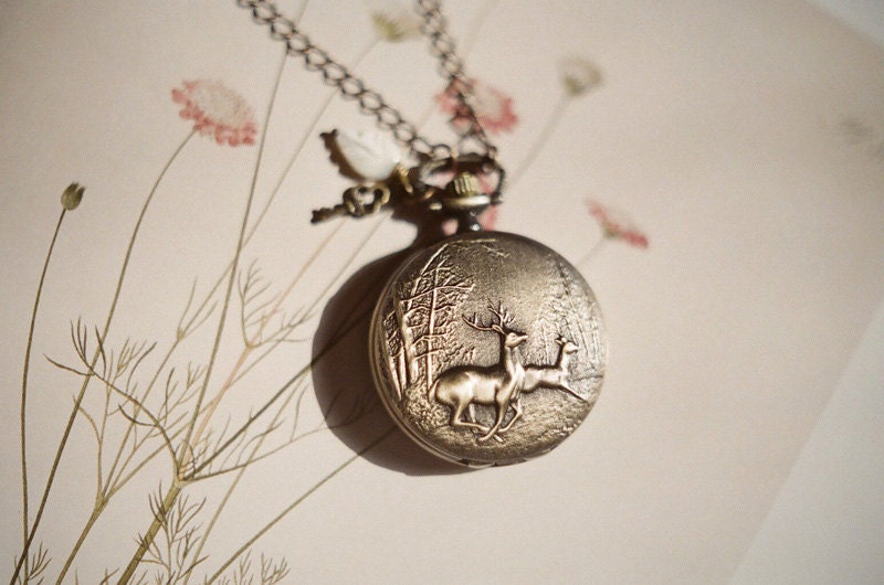 Antique bronze pocket watch necklace featuring a running deer - Discover secret places