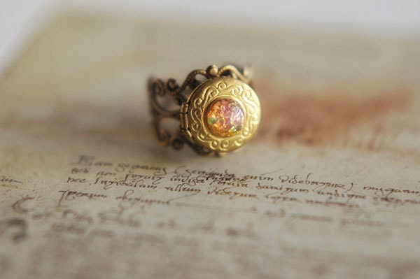 Adjustable vintage locket ring with fiery pink-orange glass opal cabochon - "of Dragons and Knights". Autumn jewelry.