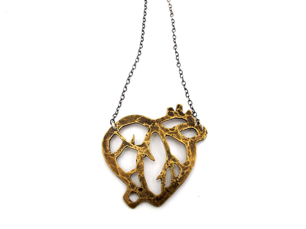 Anatomical heart in brass