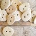 5 BEACH STONE BUTTONS...5 sweet hand drilled beach stones