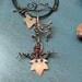 Copper Ivy Leaf and Vine Necklace with Garnets on Black Leather Cord
