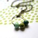 Waterdrops - necklace with glass beads and brass hoop on brass chain