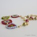 Asymetrical Gold Chain Necklace with Pearls and Colorful Beaded Flowers