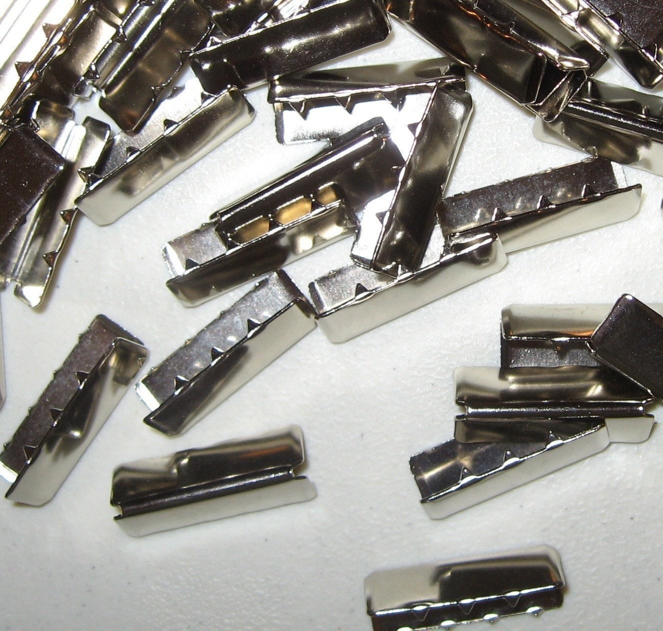 Nickel Belt Tips 1.25" 50 Pieces