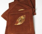 hand dyed LEAF on rust linen coasters
