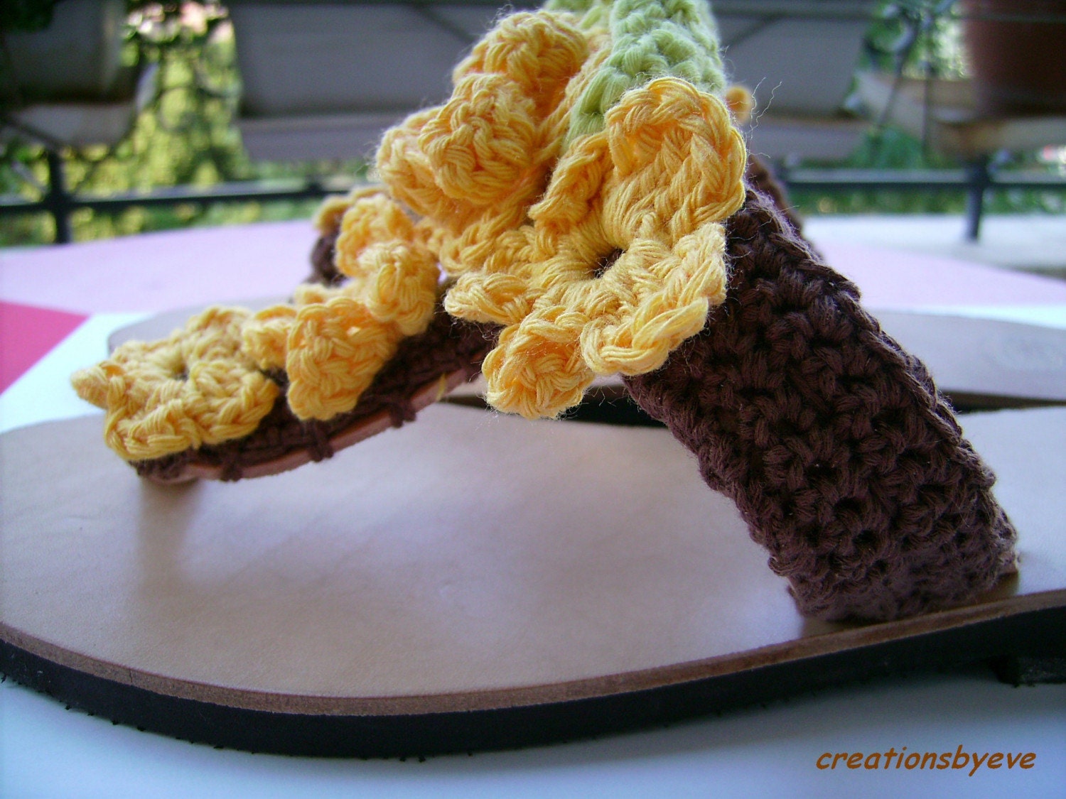Sandals with yellow crochet flowers
