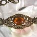 Antiqued Brass Filigree Bracelet with Topaz Glass Gem