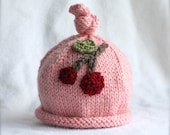 Baby girl knit hat with cherry applique.  Sizes newborn to big kid available.