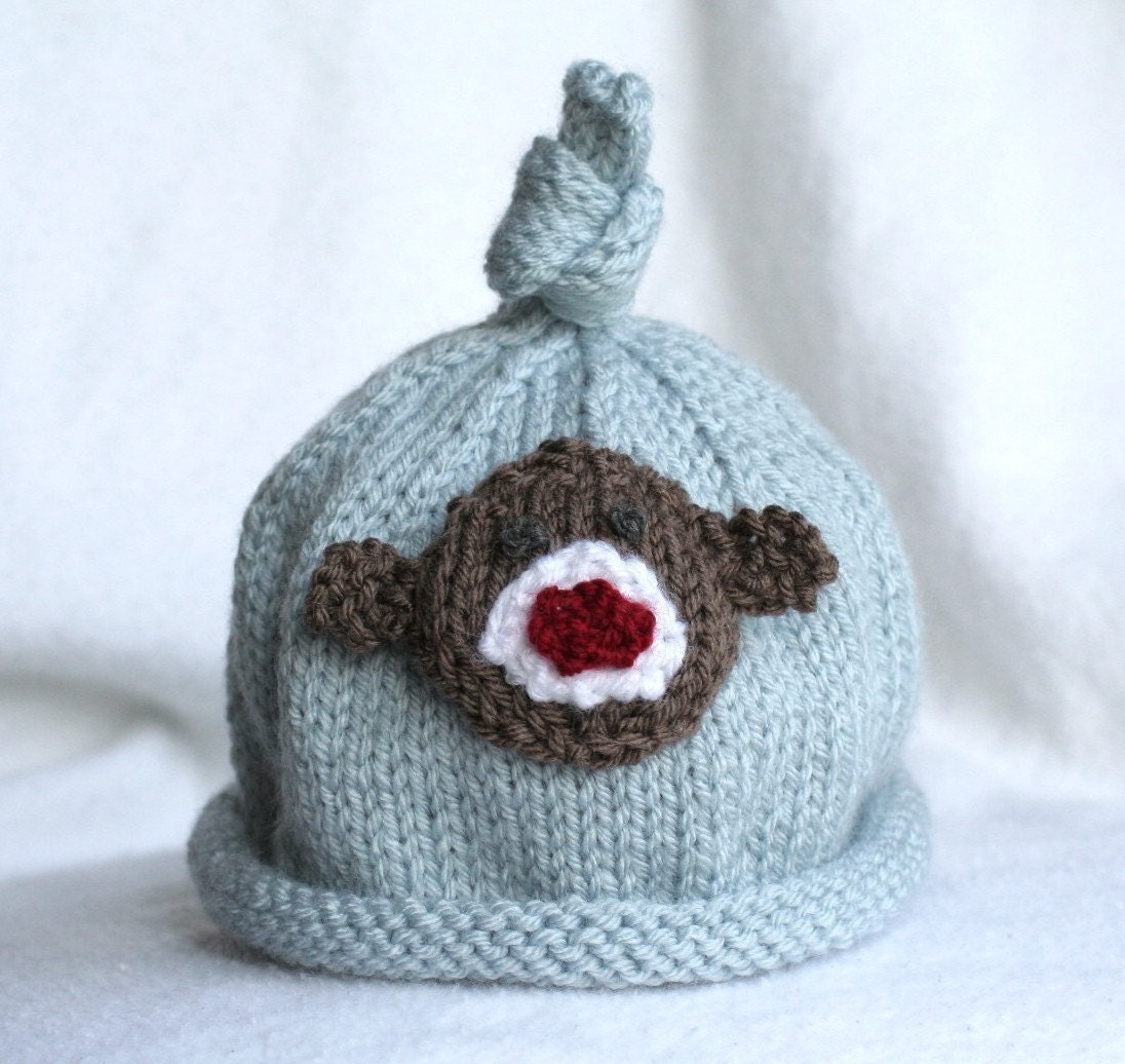 Baby boy knit hat with monkey and banana applique.  Sizes newborn-big kid available.