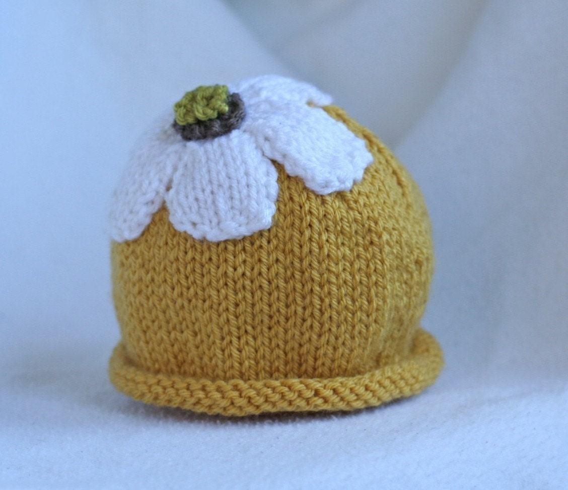 baby girl knit hat with pretty petaled flower.  sizes newborn to big kid available