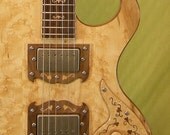 Eat Your Heart Out.  Semi-hollow Electric Guitar in salvaged wood