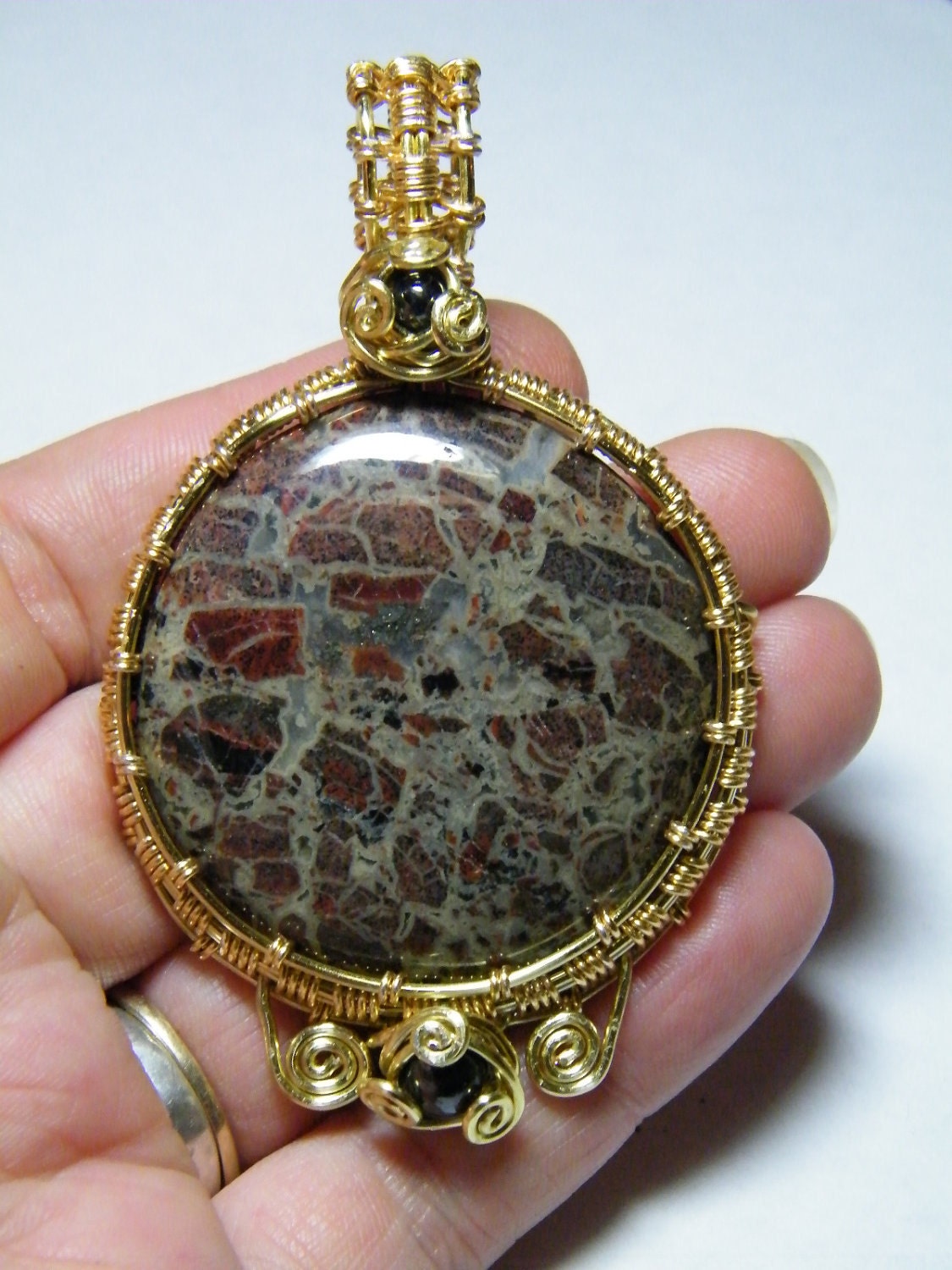Woven wire wrapped large Brecciated Jasper with hematite pendant