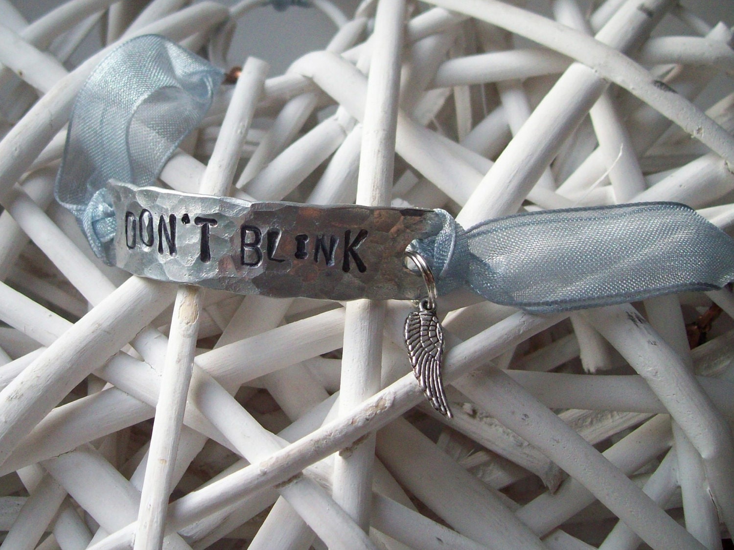 DON'T BLINK - hand-stamped aluminium bracelet
