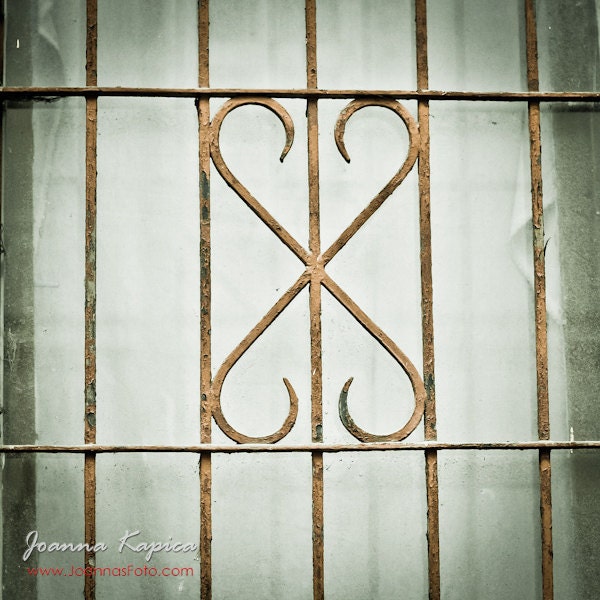 Old town Cracow element of architecture - window gate with heart shapes in vintage colors
