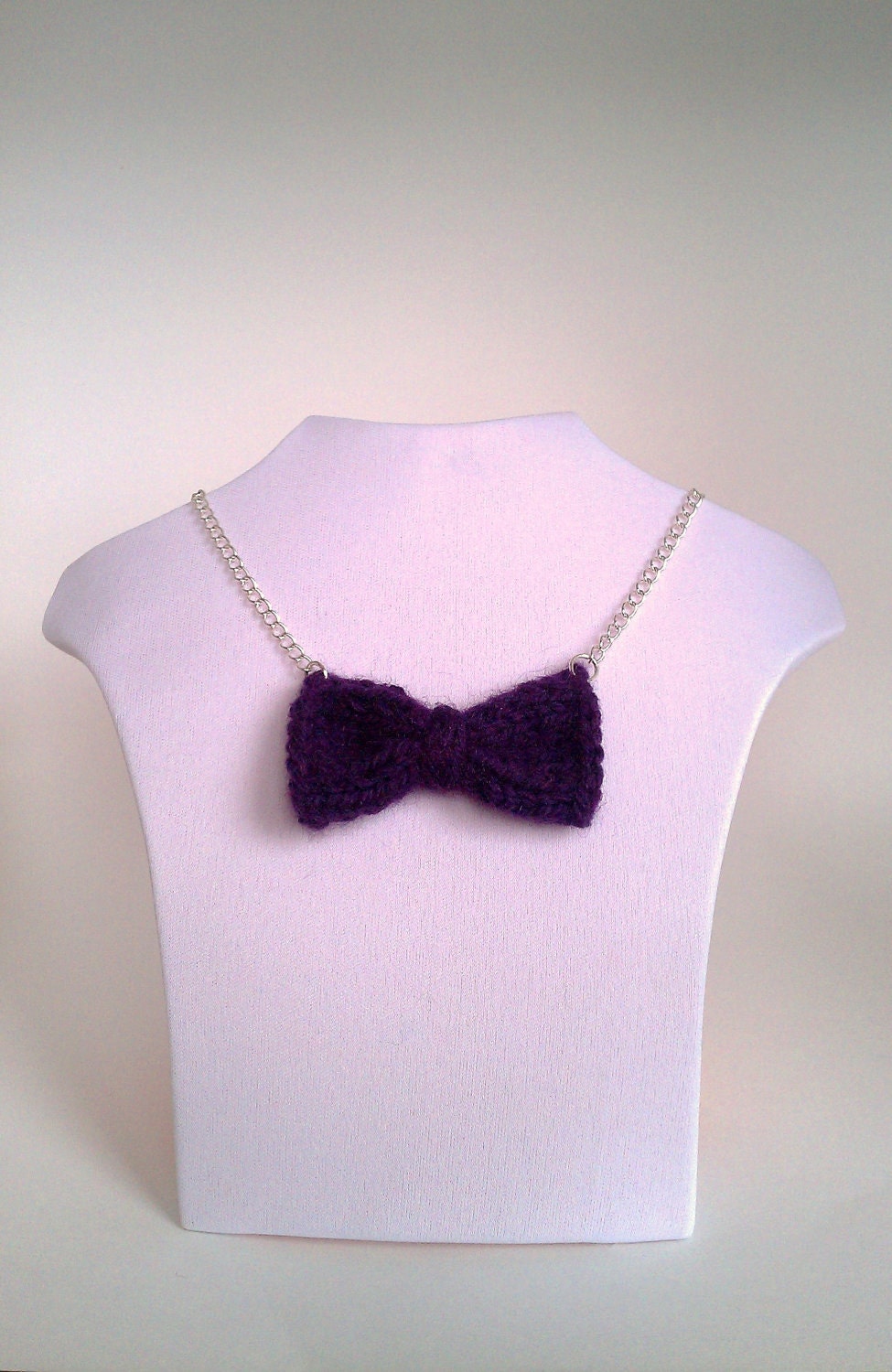 handknit bow necklace in purple - cute and girly dark purple bow pendant on a silver tone chain with lobster clasp