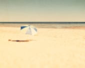 Beach umbrella nautical print sand beige summer trends seaside ocean waves pale blue horizon chilling Travel Photo
