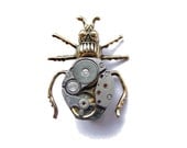 Steampunk clockwork bug brooch