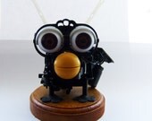 Zombie furby, solar powered, named Barry